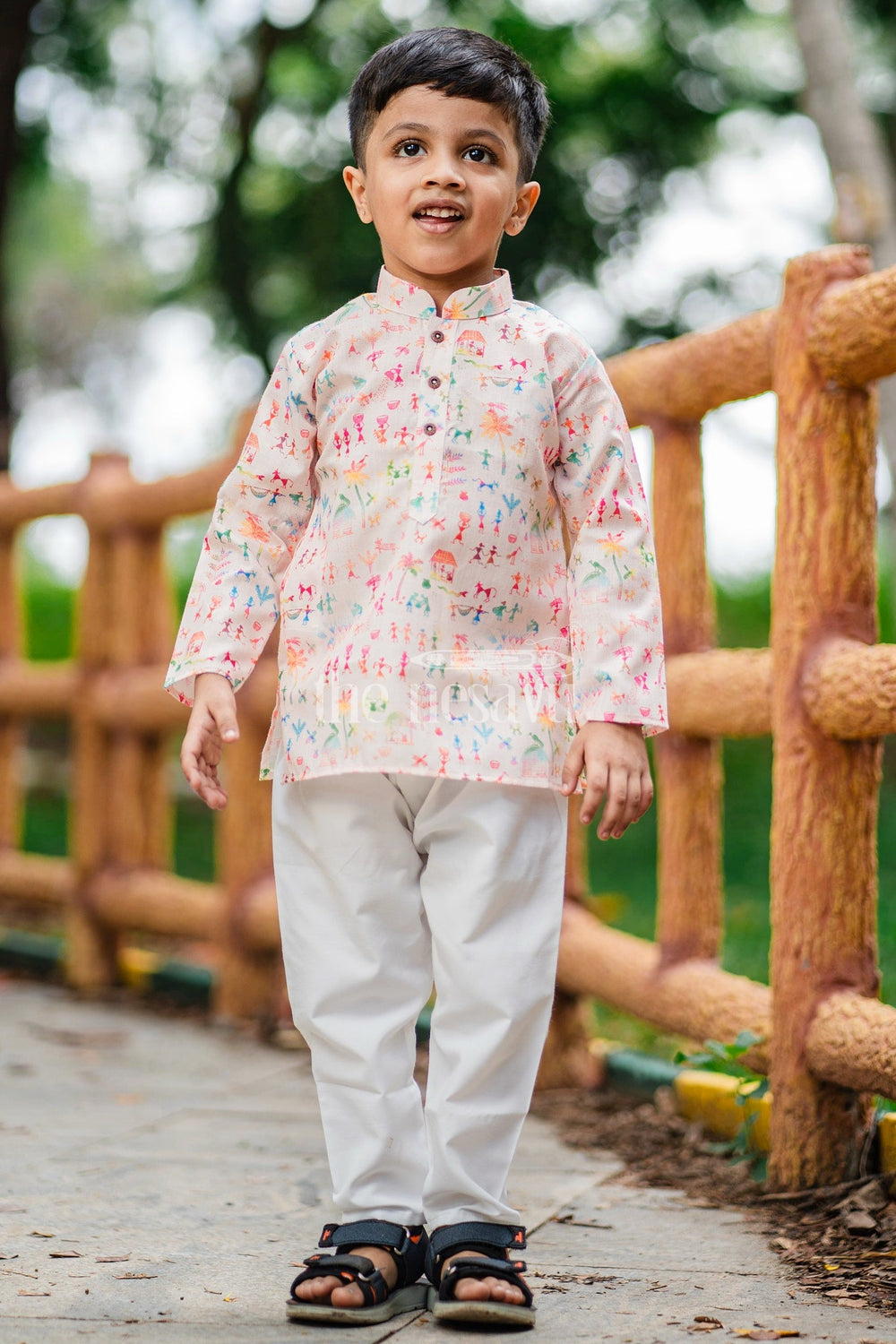 The Nesavu Boys Dothi Set Boys Pink Kurta with Dhoti and Pajama Set Featuring Playful Multicolor Print Nesavu Nesavu Boys Pink Kurta Dhoti Pajama Set Featuring Multicolor Print Festive Occasions