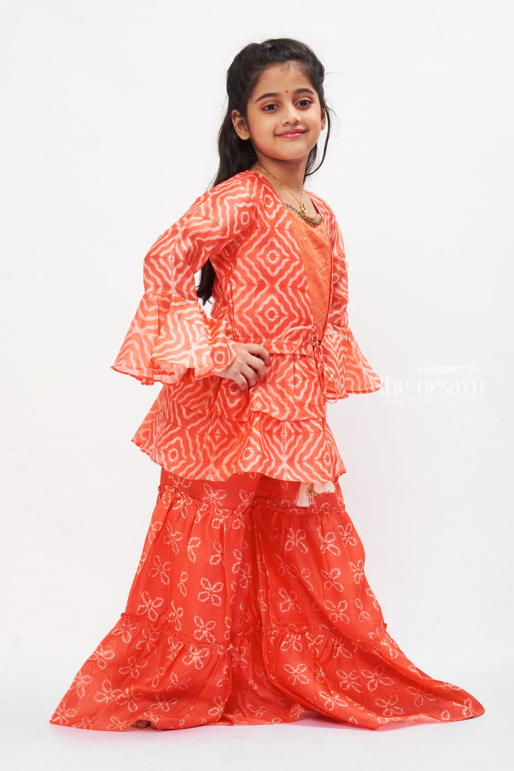 The Nesavu Girls Sharara / Plazo Set Coral Reef Flared Gharara Set with Tassel Detail for Girls Nesavu Shop Girls Coral Flared Gharara Set | Summer Festive Wear Online | The Nesavu