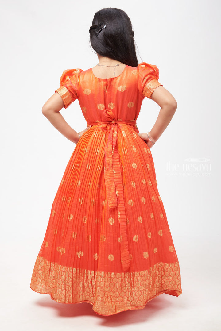 The Nesavu Girls Silk Gown Crimson Elegance: Orange Anarkali with Gilded Accents and Tassel Detailing Nesavu Royal Affair: Anarkali Gowns for Timeless Grace | The Nesavu