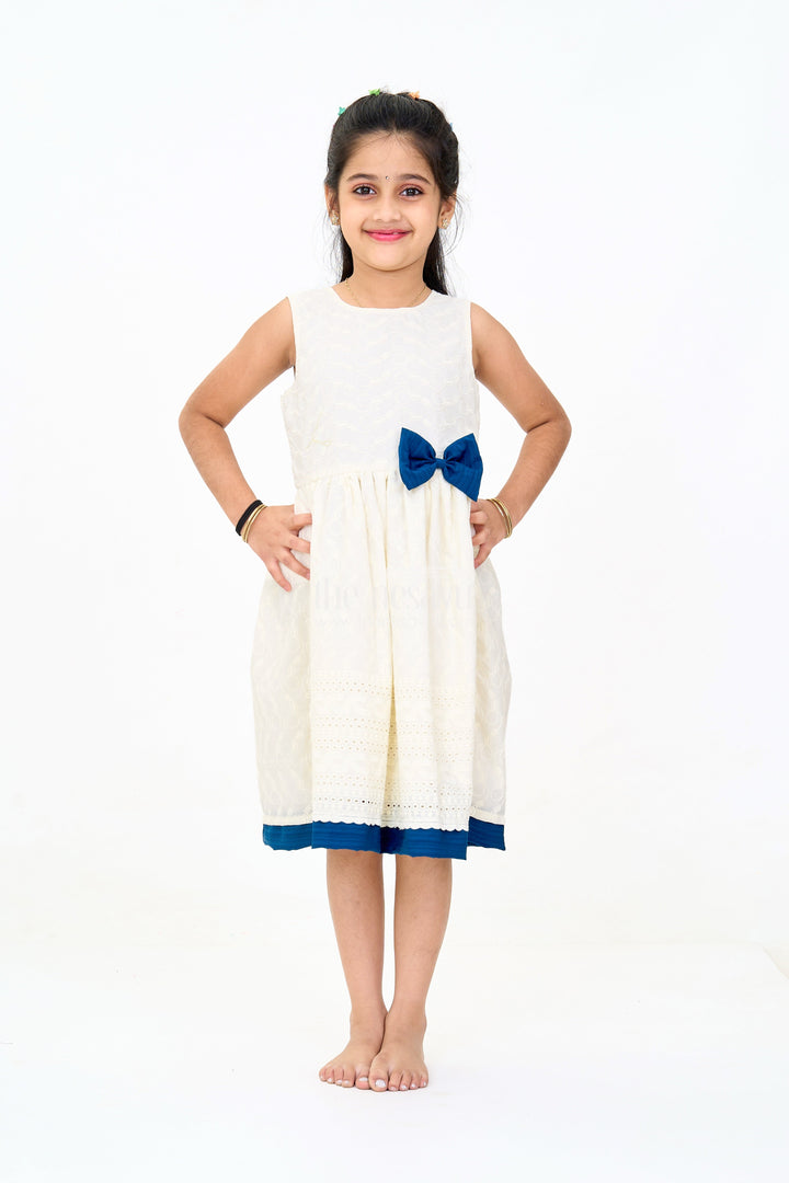 The Nesavu Girls Cotton Frock Elegant Girls White Hakoba Cotton Frock with Contrasting Bow and Delicate Detailing Nesavu 18 (2Y) / White GFC1342E-18 Nesavu Girls White Hakoba Cotton Frock Contrasting Bow Elegant Embroidery