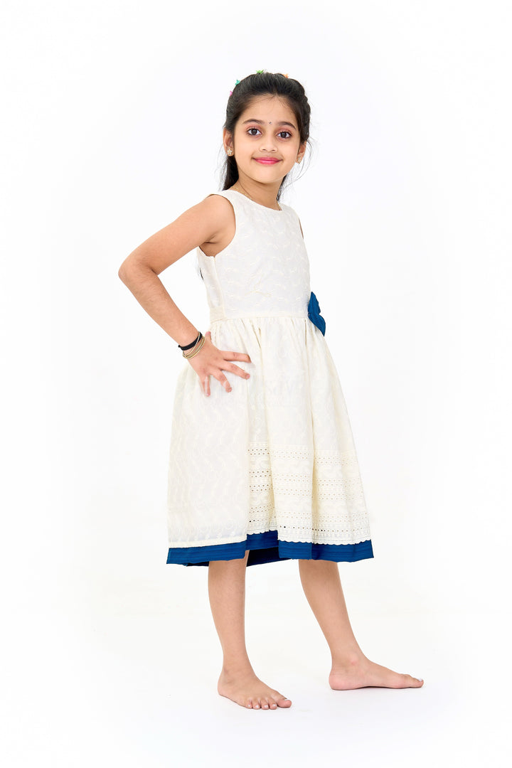 The Nesavu Girls Cotton Frock Elegant Girls White Hakoba Cotton Frock with Contrasting Bow and Delicate Detailing Nesavu Nesavu Girls White Hakoba Cotton Frock Contrasting Bow Elegant Embroidery