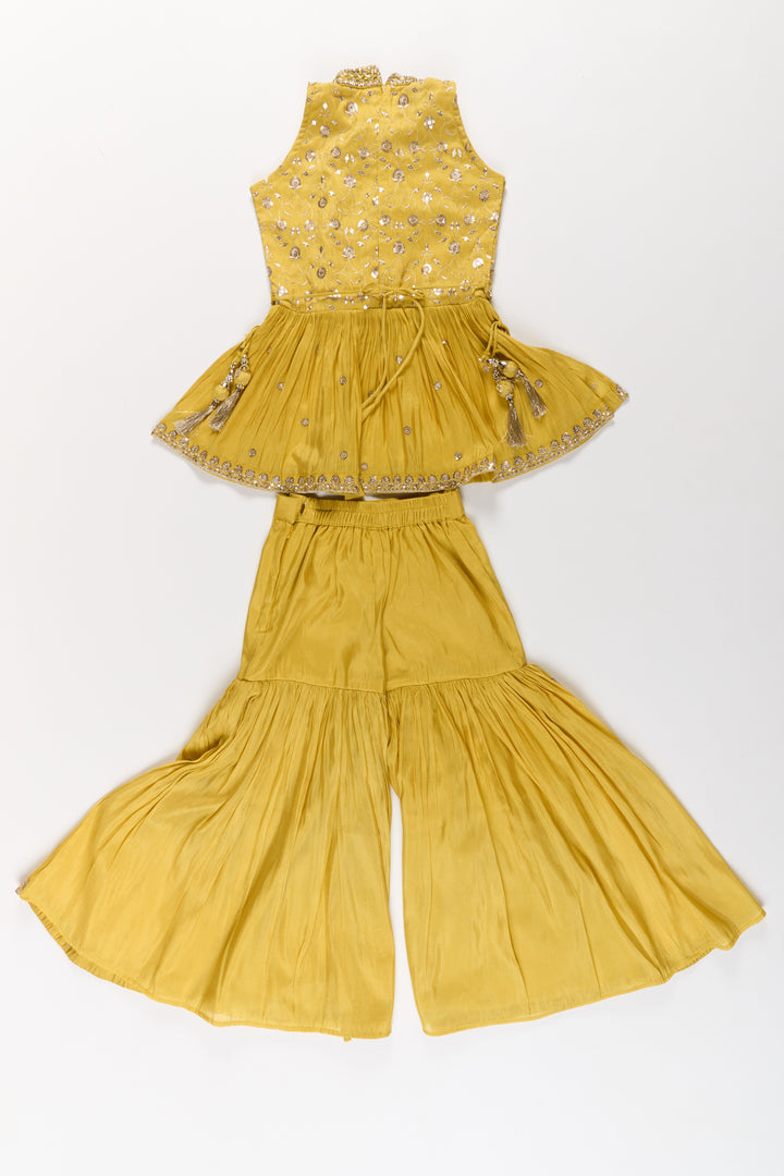 The Nesavu Girls Sharara / Plazo Set Elegant Yellow Georgette Girls Sharara Set with Sequin Embroidery and Peplum Top Nesavu Yellow Georgette Girls Sharara Set Sequin Embroidery Peplum Top | The Nesavu