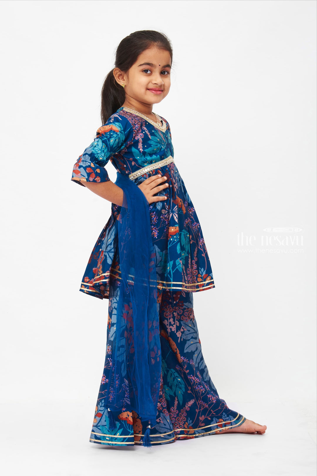 The Nesavu Girls Sharara / Plazo Set Girls Bohemian Floral Peplum Top with Gharara Pants - Trendy Ethnic Wear Nesavu Floral Print Alia Cut Tops | Casual Floral Set for Girls | The Nesavu