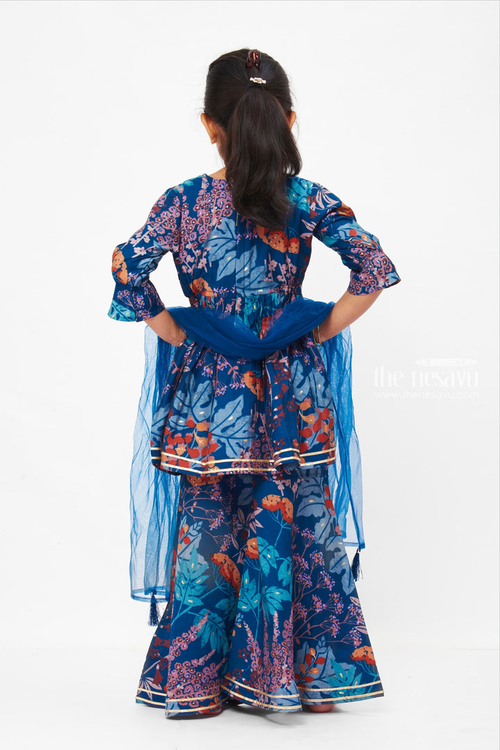 The Nesavu Girls Sharara / Plazo Set Girls Bohemian Floral Peplum Top with Gharara Pants - Trendy Ethnic Wear Nesavu Floral Print Alia Cut Tops | Casual Floral Set for Girls | The Nesavu