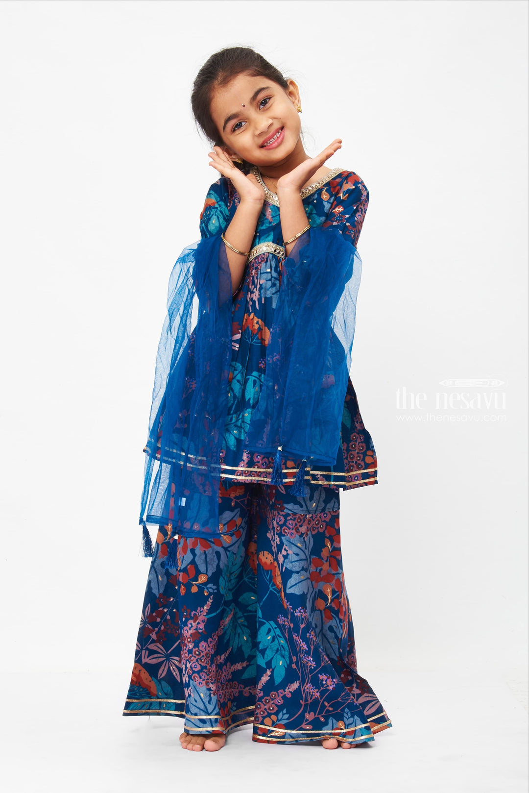 The Nesavu Girls Sharara / Plazo Set Girls Bohemian Floral Peplum Top with Gharara Pants - Trendy Ethnic Wear Nesavu Floral Print Alia Cut Tops | Casual Floral Set for Girls | The Nesavu