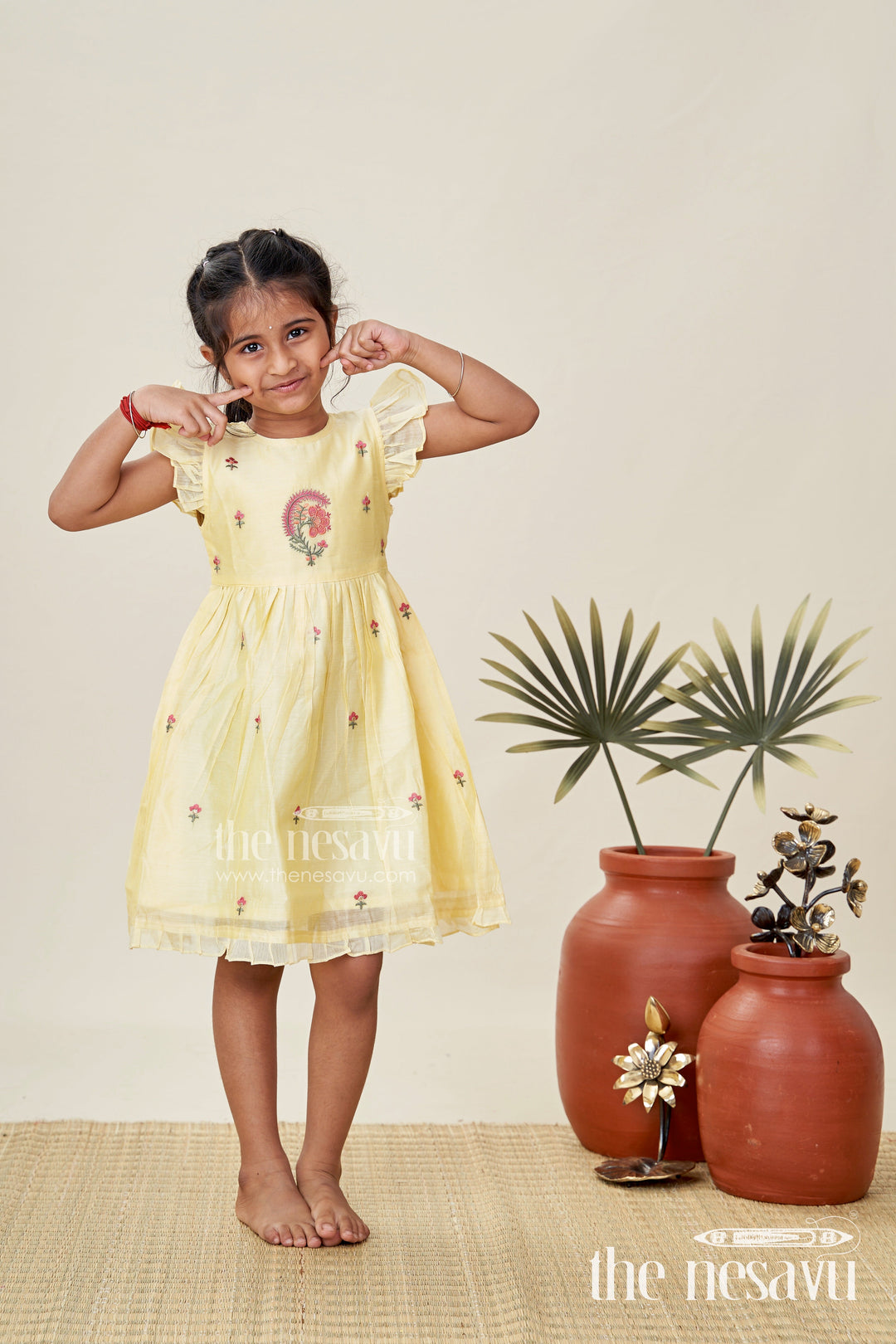 The Nesavu Girls Chanderi Frock Girls Chanderi Frock in Vibrant Colors with Thread Embroidery for Festive Moments Nesavu 16 (1Y) / Yellow GFC1839A-16 Nesavu Yellow Chanderi Cotton Girls Frock Floral Embroidery Ruffled Sleeves Traditional Wear