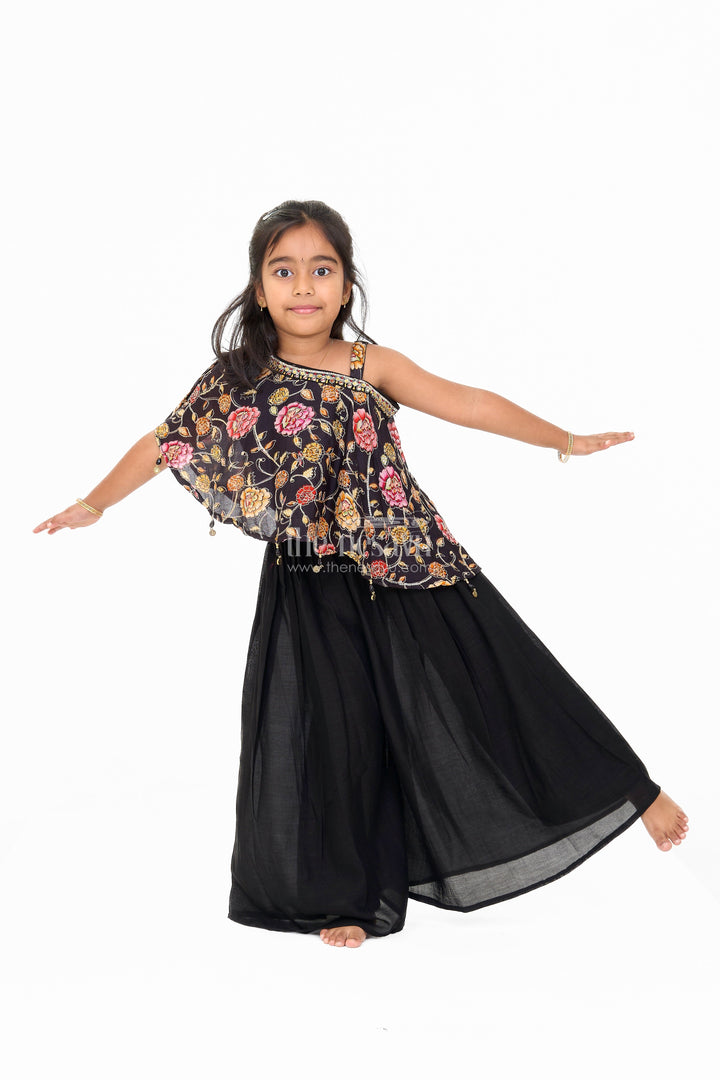 The Nesavu Girls Sharara / Plazo Set Girls Christmas Themed Dresses in Black Georgette with Floral Cape Nesavu Nesavu Girls Christmas Themed Dresses Black Georgette Vibrant Floral Cape