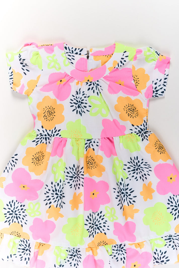 The Nesavu Girls Cotton Frock Girls Cotton Party Wear Dress with Vibrant Floral Prints and Ruffles Nesavu Vibrant Girls Cotton Party Wear Dress Ruffles Floral Prints | The Nesavu