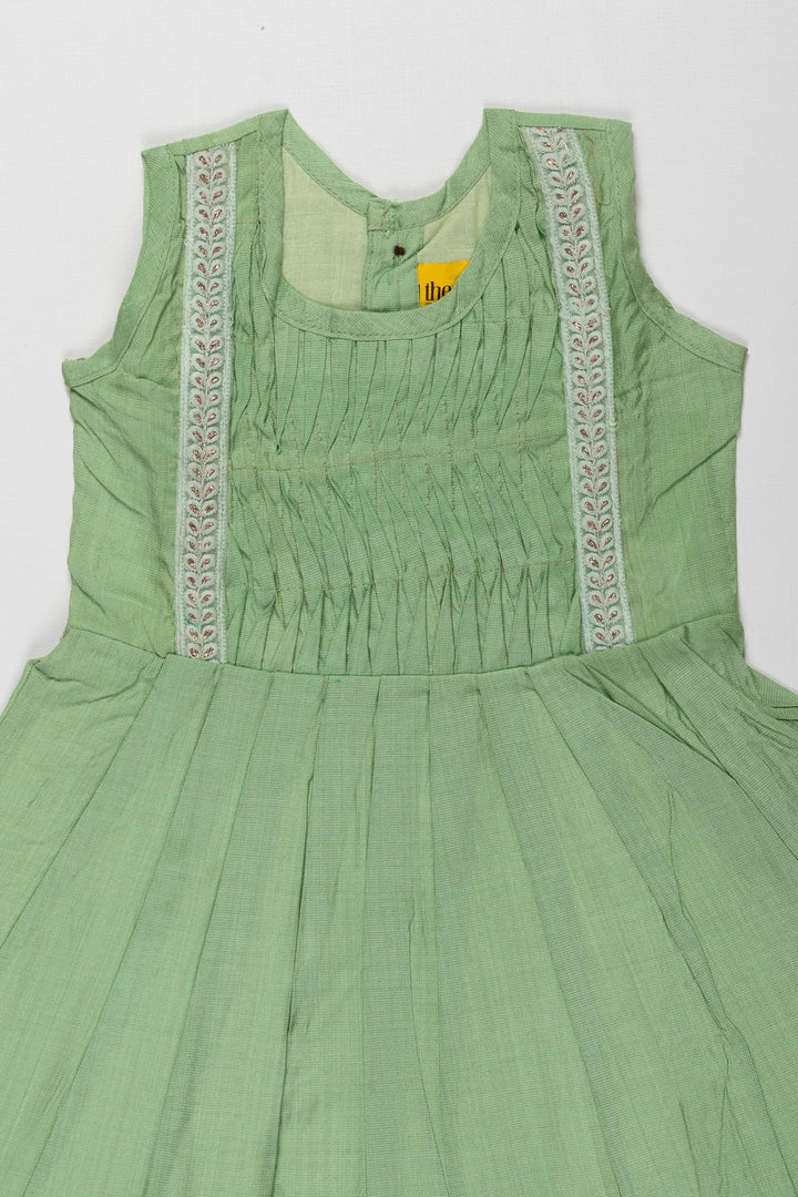 The Nesavu Girls Cotton Frock Girls Enchanted Garden Cotton Frock - Lush Green with Delicate Lace Nesavu Lace Trimmed Green Cotton Dress for Girls | Summer Wardrobe Essential | The Nesavu