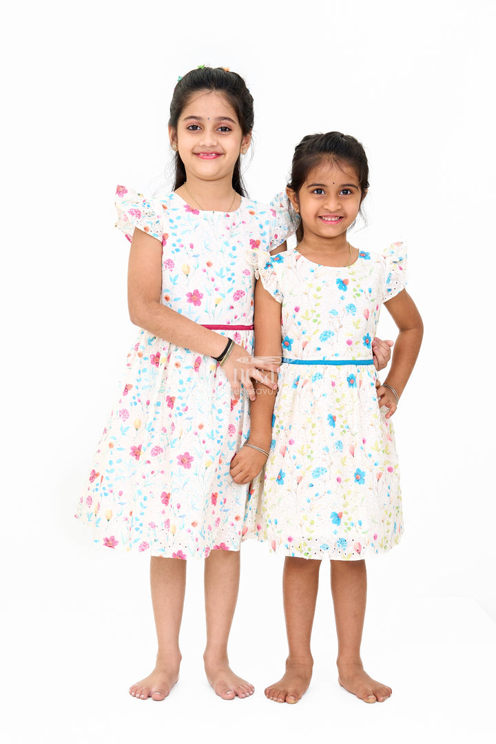 The Nesavu Girls Cotton Frock Girls Fancy Mini Dress with Floral Embroidery, Ruffled Sleeves, and Red Waistband Nesavu Girls Fancy Mini Dress Floral Embroidery Ruffled Sleeves Red Waistband | The Nesavu