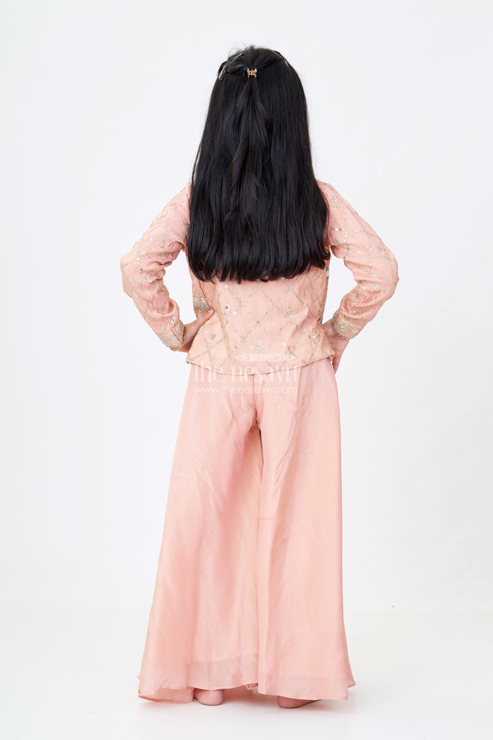 The Nesavu Girls Sharara / Plazo Set Girls Sharara Plazo Set with Embellished Jacket and Flowy Pants in Peach Nesavu Girls Peach Sharara Plazo Set Embellished Jacket Flowy Pants | The Nesavu