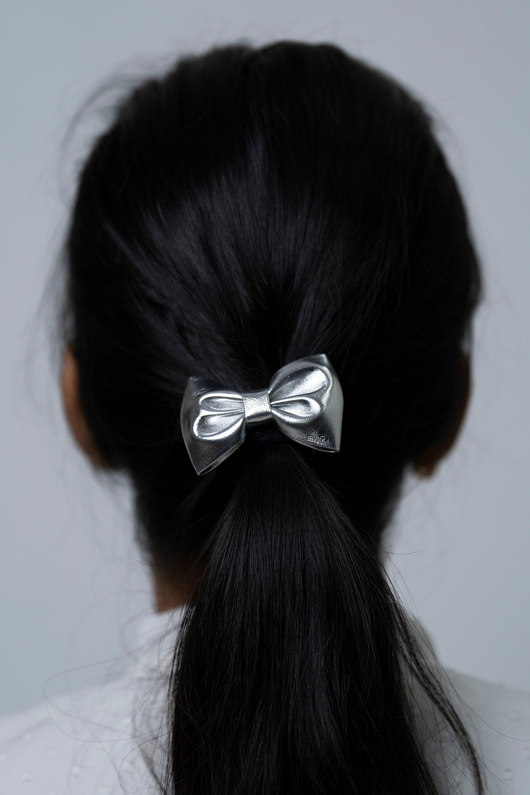 The Nesavu Hair Clip Luxurious Metallic Bow Hair Clip for Elegant Hairstyles Nesavu Silver JHCL73A Stylish Silver Bow Hair Clip | Secure & Chic Hair Accessory | The Nesavu