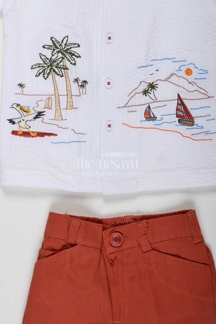The Nesavu Boys Casual Set Orange Traditional Dress Set for Boys in Crush Cotton with Seaside Embroidery and Burnt Orange Shorts Nesavu Nesavu Orange Traditional Dress Set for Boys with Coastal Embroidery Shirt and Crush Cotton Burnt Orange Shorts