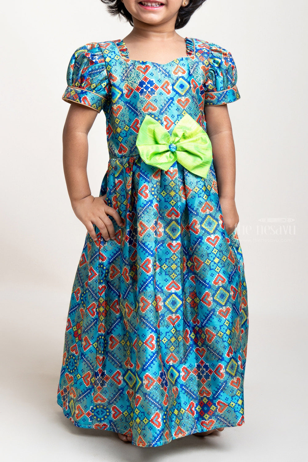 The Nesavu Silk Gown Patola Printed Blue Anarkali With Bow Embellishment For Girls Nesavu Silk Cotton Anarkali For Baby Girls | Ethnic Wear Dresses | The Nesavu