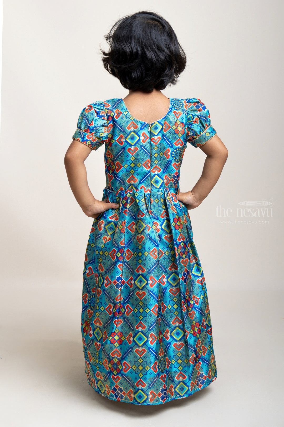 The Nesavu Silk Gown Patola Printed Blue Anarkali With Bow Embellishment For Girls Nesavu Silk Cotton Anarkali For Baby Girls | Ethnic Wear Dresses | The Nesavu