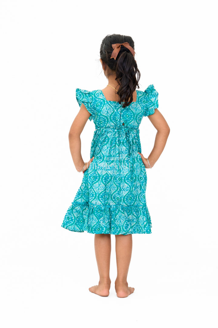 The Nesavu Girls Cotton Frock Ruffled Babydoll Mini Dress for Girls in Teal with Intricate Print Nesavu Nesavu Ruffled Babydoll Mini Dress Girls Teal Intricate Prints