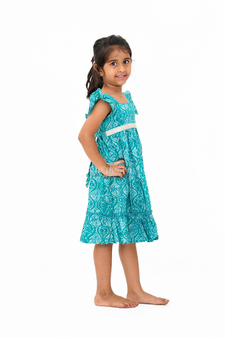 The Nesavu Girls Cotton Frock Ruffled Babydoll Mini Dress for Girls in Teal with Intricate Print Nesavu Nesavu Ruffled Babydoll Mini Dress Girls Teal Intricate Prints