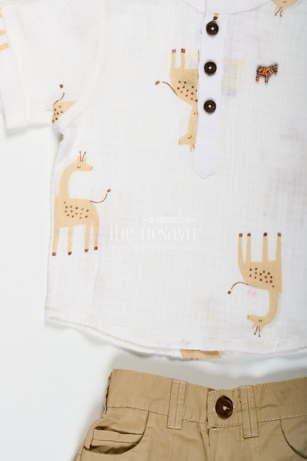The Nesavu Boys Casual Set Shirt Trouser Set for Boys in Muslin Cotton with Giraffe Print and Button Detail on Cream Shirt and Khaki Shorts Nesavu Nesavu Shirt Trouser Set for Boys in Muslin Cotton with Giraffe Print Shirt and Comfortable Khaki Shorts