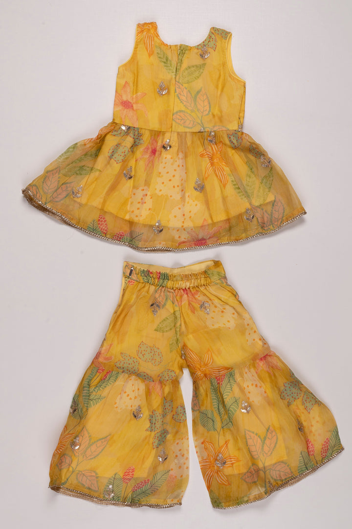 The Nesavu Girls Sharara / Plazo Set Sunshine Yellow Layered Gharara Set with Sparkling Sequins for Girls Nesavu Buy Girls Yellow Sequined Gharara Set | Vibrant Floral Themed Outfit | The Nesavu