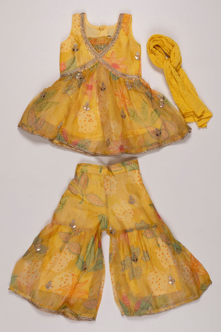 The Nesavu Girls Sharara / Plazo Set Sunshine Yellow Layered Gharara Set with Sparkling Sequins for Girls Nesavu Buy Girls Yellow Sequined Gharara Set | Vibrant Floral Themed Outfit | The Nesavu
