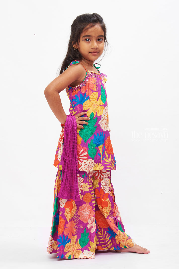 The Nesavu Girls Sharara / Plazo Set Vibrant Floral Print Girls Gharara Set with Tassel Accents Nesavu Shop Floral Gharara Set for Girls Online | Colorful Summer Ethnic Wear | The Nesavu