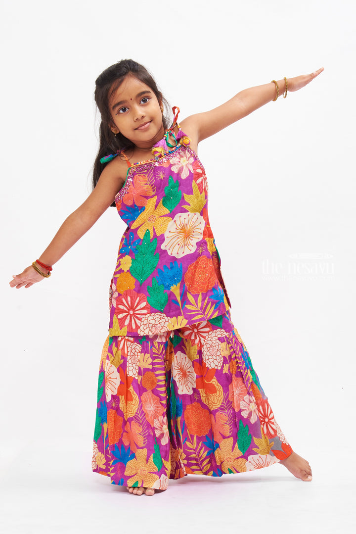 The Nesavu Girls Sharara / Plazo Set Vibrant Floral Print Girls Gharara Set with Tassel Accents Nesavu Shop Floral Gharara Set for Girls Online | Colorful Summer Ethnic Wear | The Nesavu