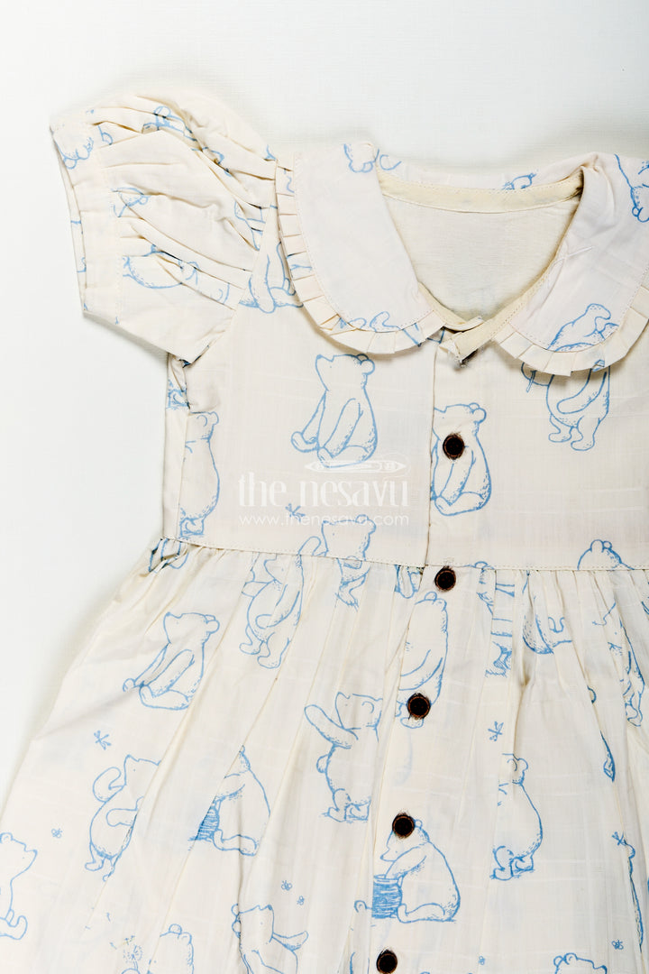 Girls Latest Cotton Dress in White with Allover Digital Animal Print and Classic Peter Pan Collar