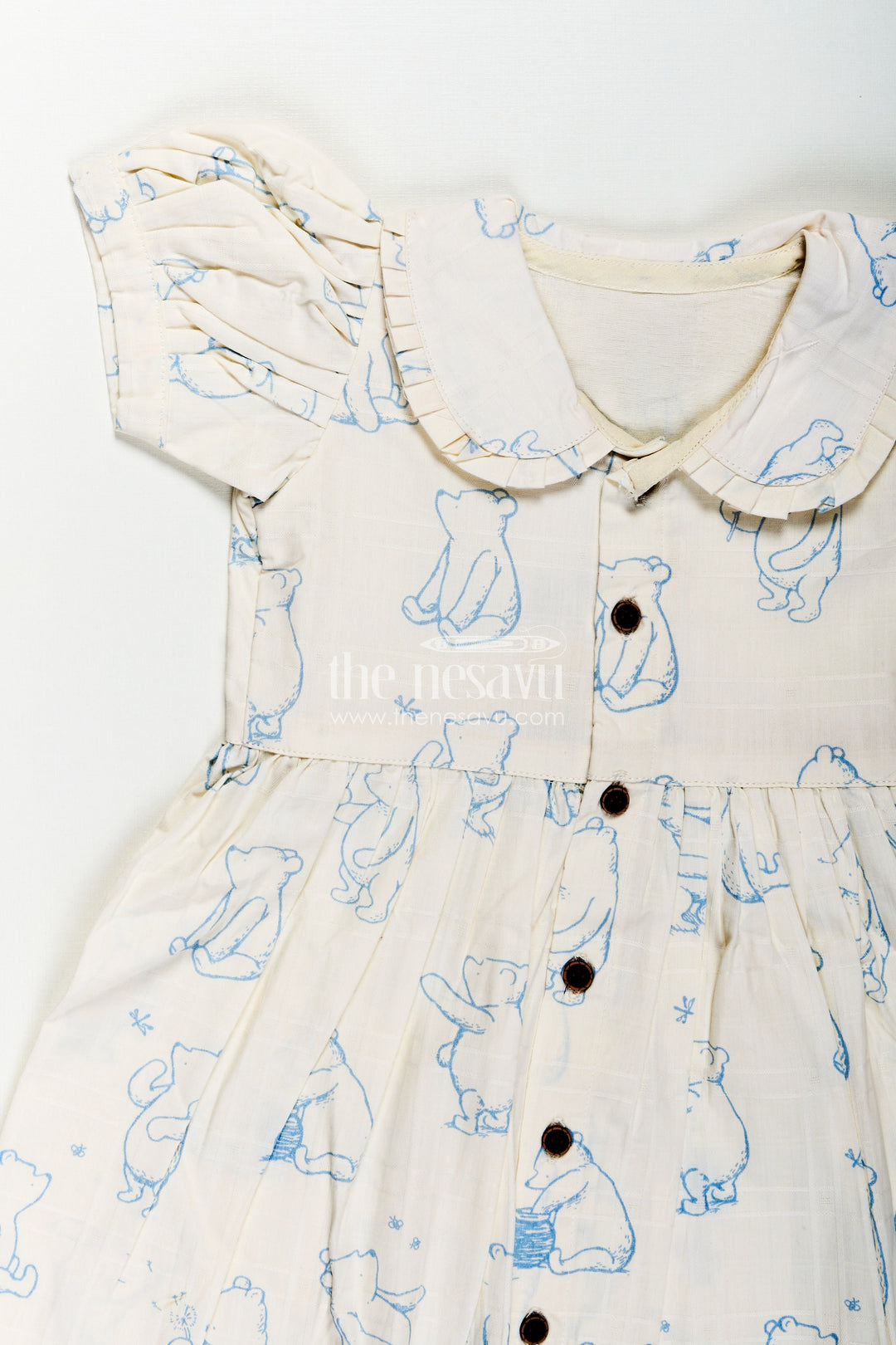Girls Latest Cotton Dress in White with Allover Digital Animal Print and Classic Peter Pan Collar