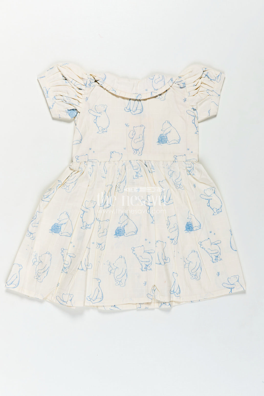 Girls Latest Cotton Dress in White with Allover Digital Animal Print and Classic Peter Pan Collar