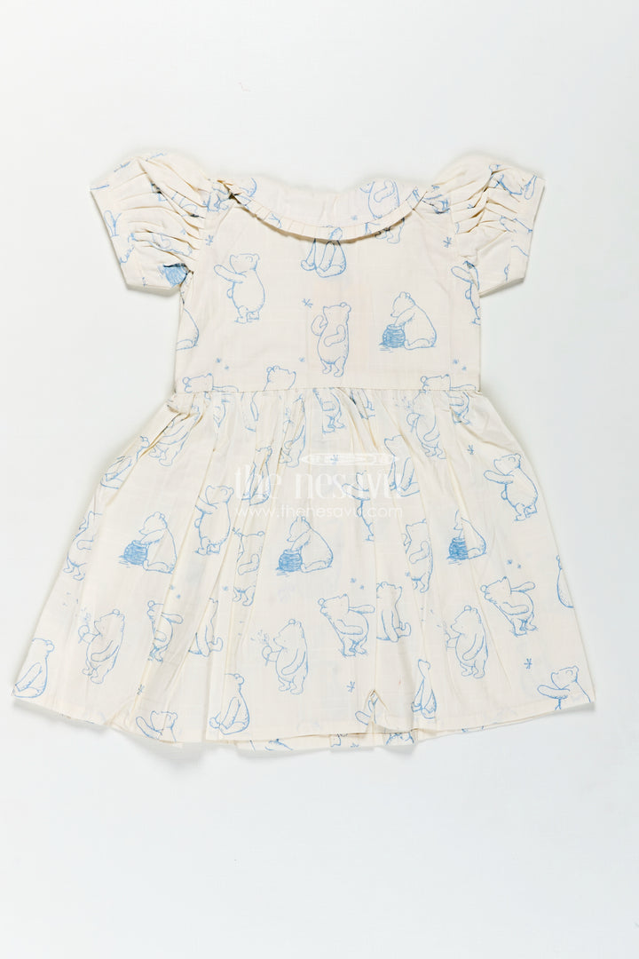 Girls Latest Cotton Dress in White with Allover Digital Animal Print and Classic Peter Pan Collar