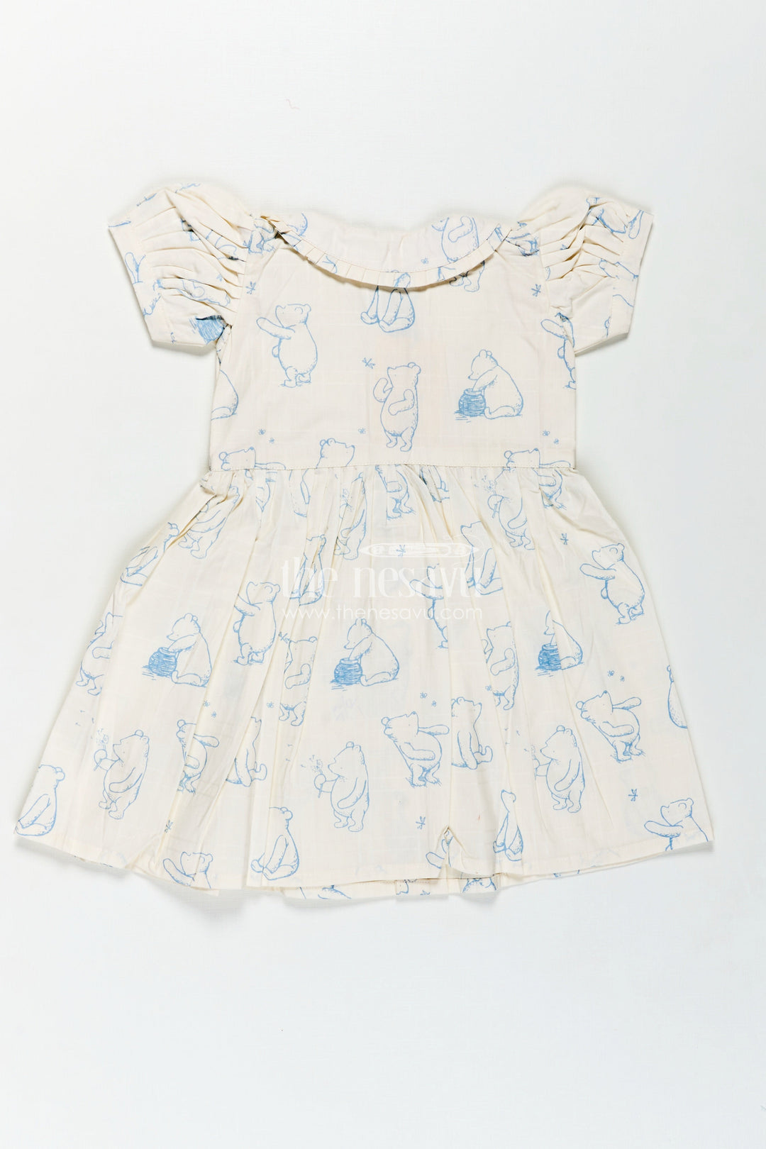 Girls Latest Cotton Dress in White with Allover Digital Animal Print and Classic Peter Pan Collar