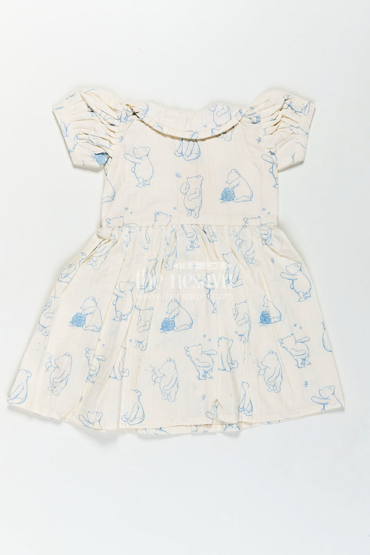 Girls Latest Cotton Dress in White with Allover Digital Animal Print and Classic Peter Pan Collar