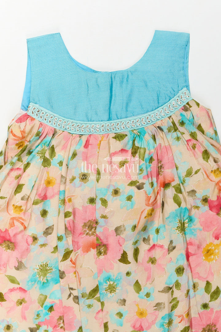 Girls Printed Viscose Frock with Bright Floral Motifs and Blue Yoke in Long Frock for Party Wear Style