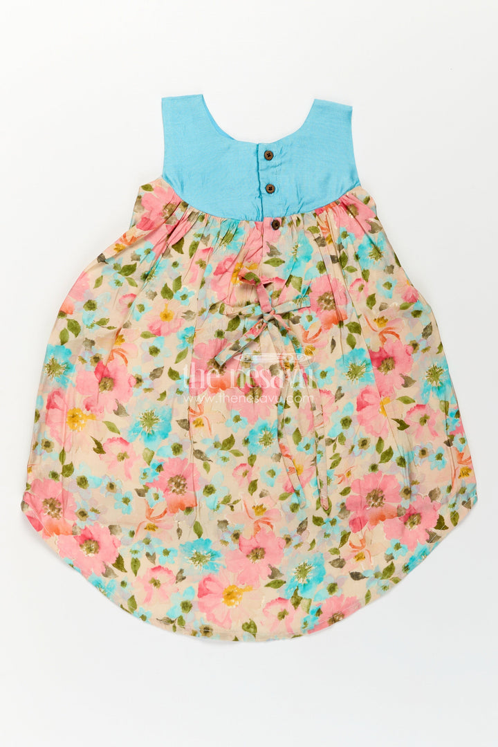 Girls Printed Viscose Frock with Bright Floral Motifs and Blue Yoke in Long Frock for Party Wear Style