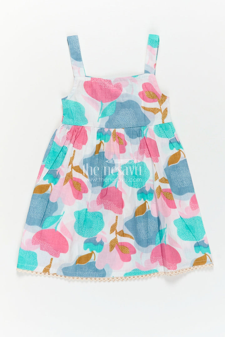 Girls Cotton Short Frock Party Wear in Sleeveless Style with Bold Floral Print on Pastel Base