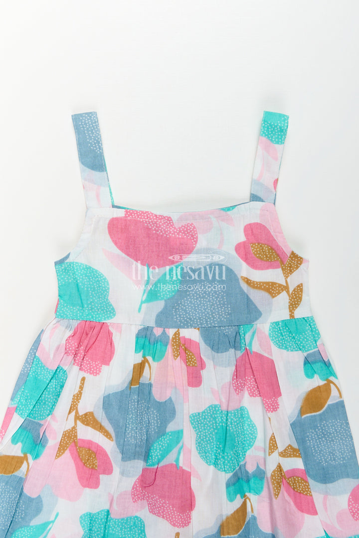 Girls Cotton Short Frock Party Wear in Sleeveless Style with Bold Floral Print on Pastel Base