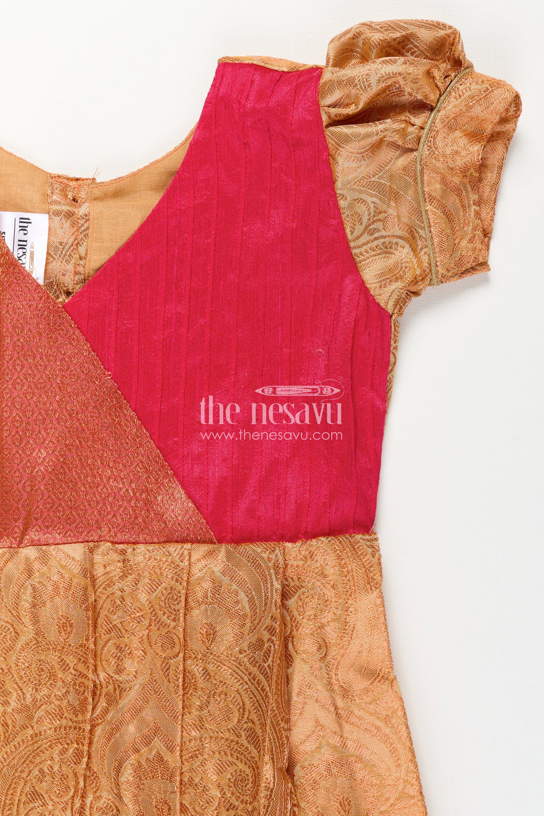 Girls Semi Silk Orange Silk Frock with Magenta Pin-Tuck Yoke and Bold Jacquard Hem Border