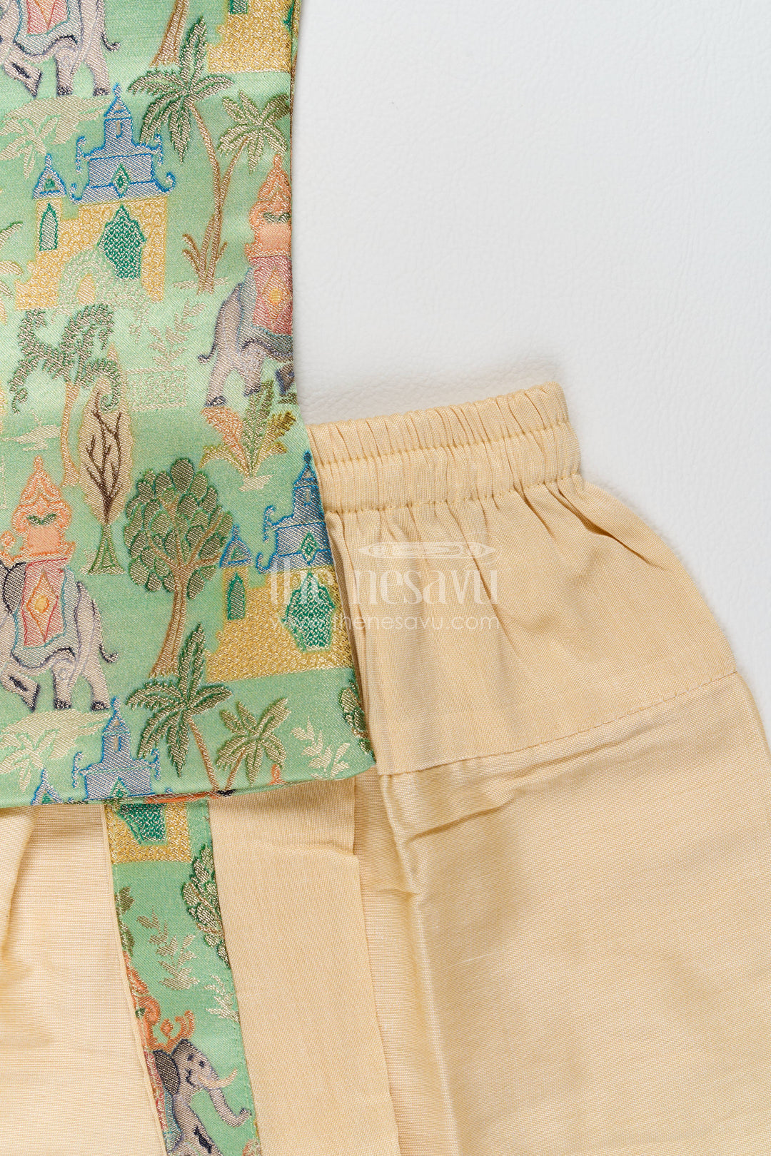 Pattu Pancha Set in Green with Elephant Detailing for Family Functions