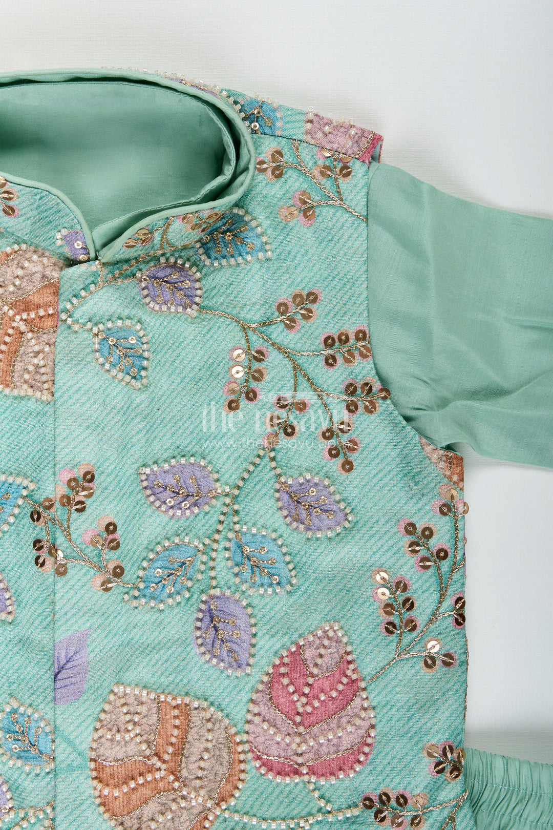 Boys kurta set with embroidered jacket for weddings and special occasions