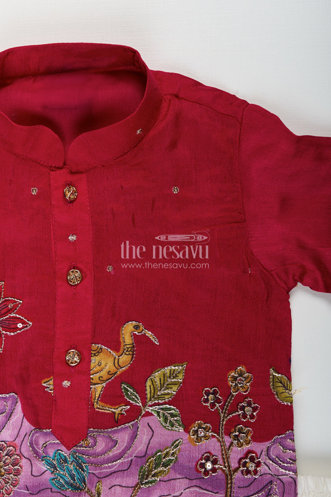 Embroidered boys kurta set with animal and lotus motifs for cultural events