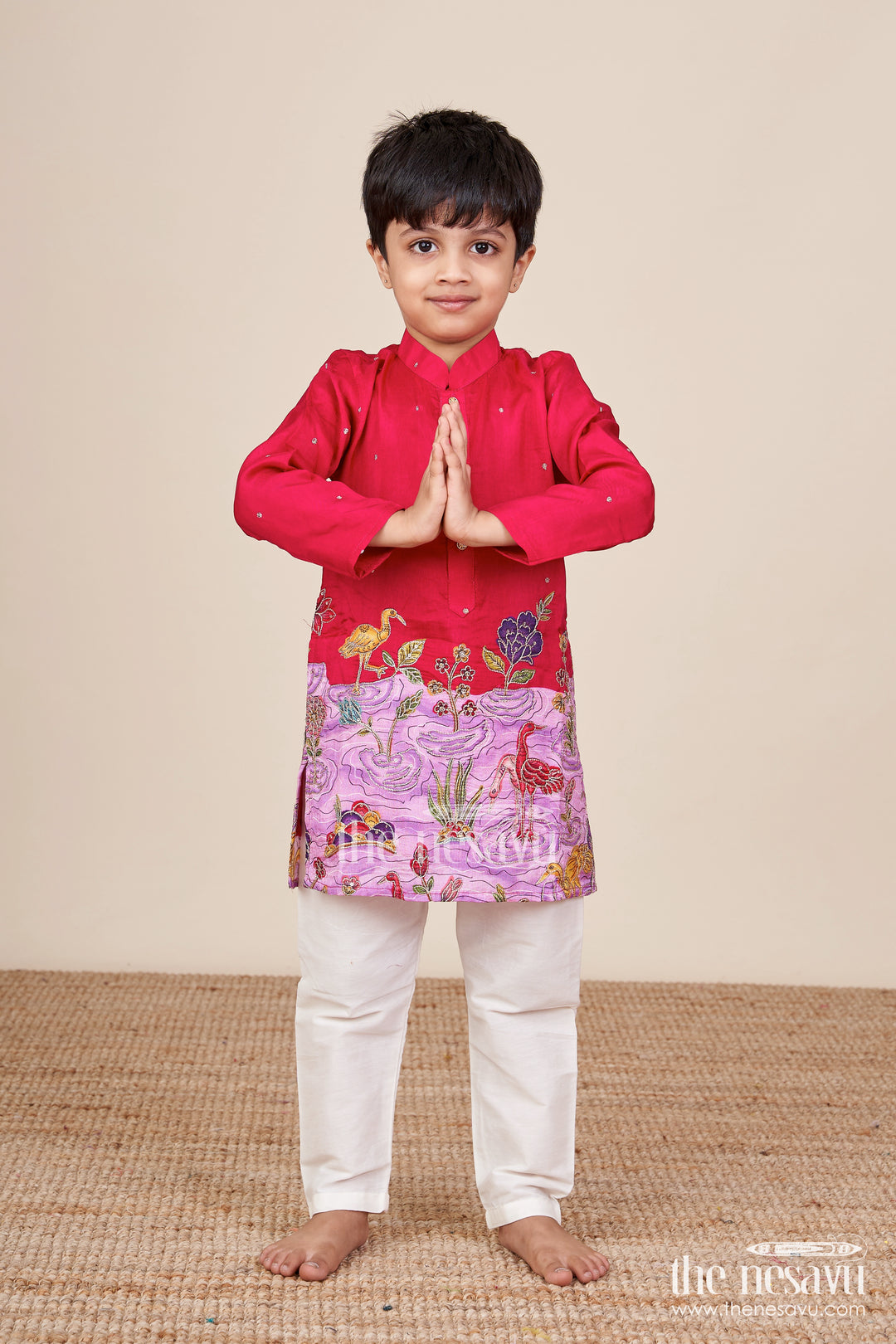 Embroidered boys kurta set with animal and lotus motifs for cultural events
