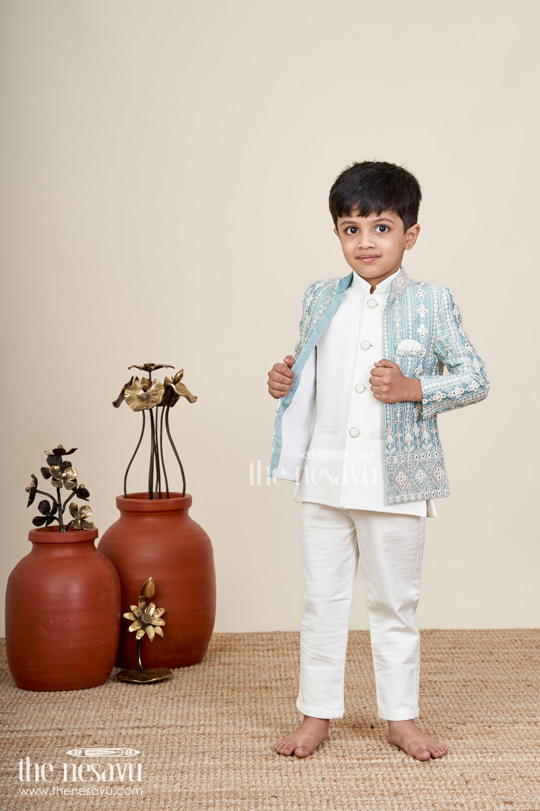 Boys green embroidered jacket set with white kurta pajama