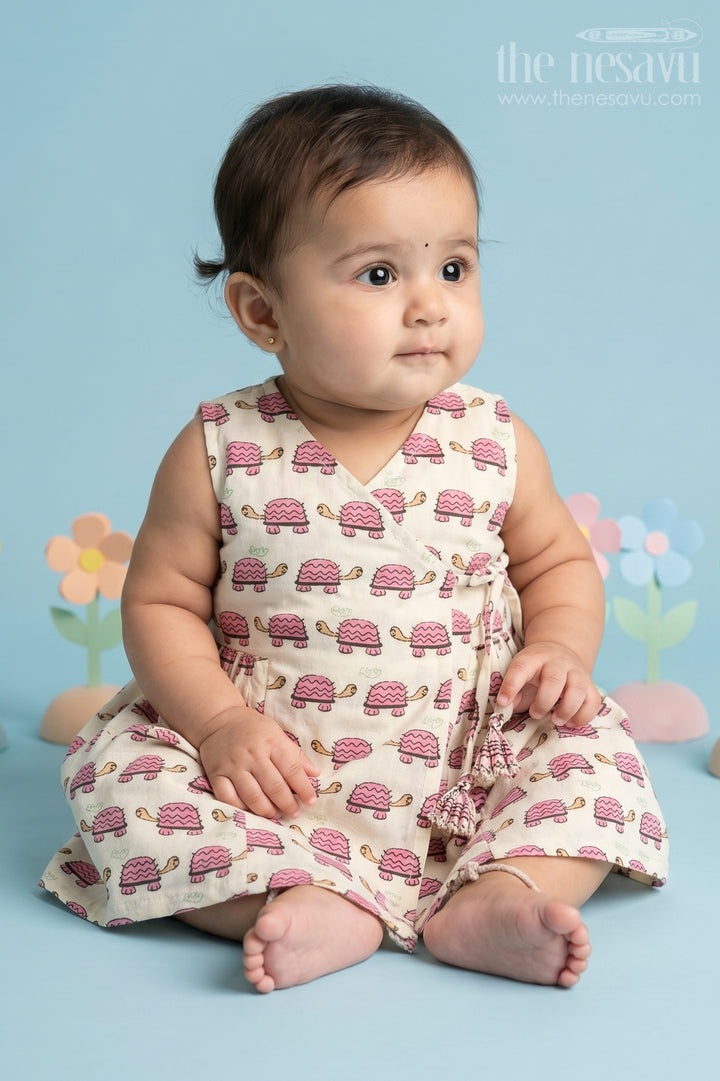 Mini Cotton Frock for Babies with Pink Tortoise Print Ideal for Playful Days
