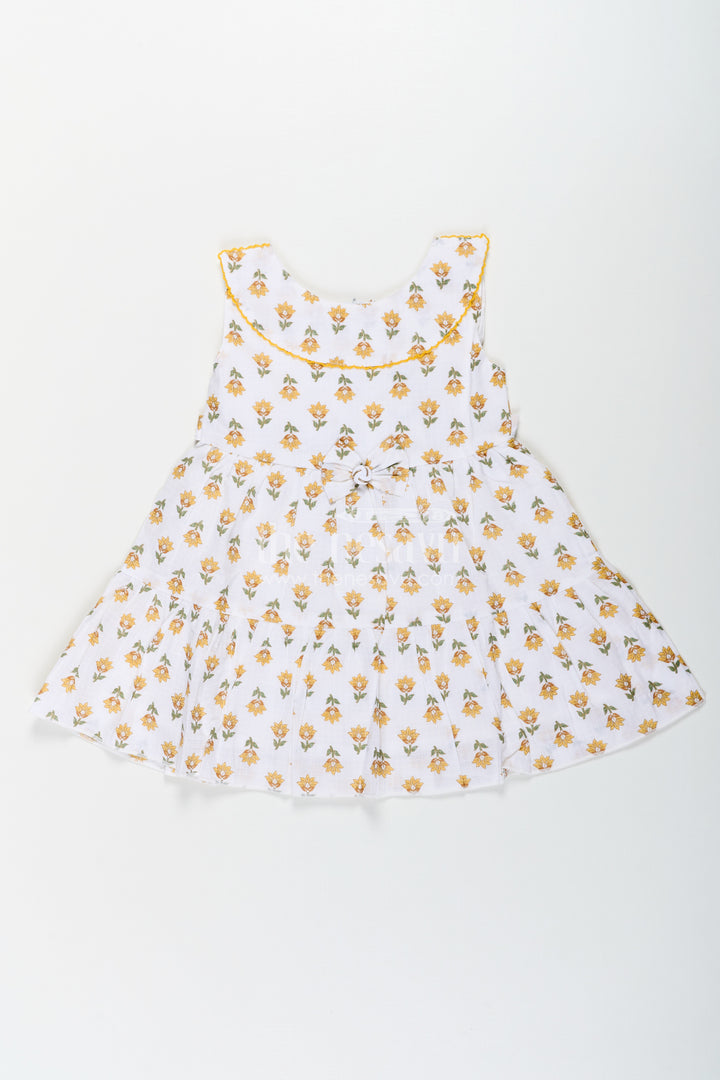 Girls New Modern Frock in Pure Cotton with Floral Prints and Peter Pan Collar