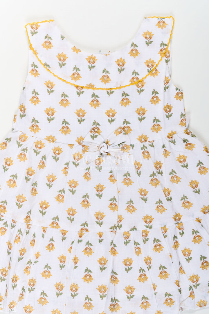 Girls New Modern Frock in Pure Cotton with Floral Prints and Peter Pan Collar