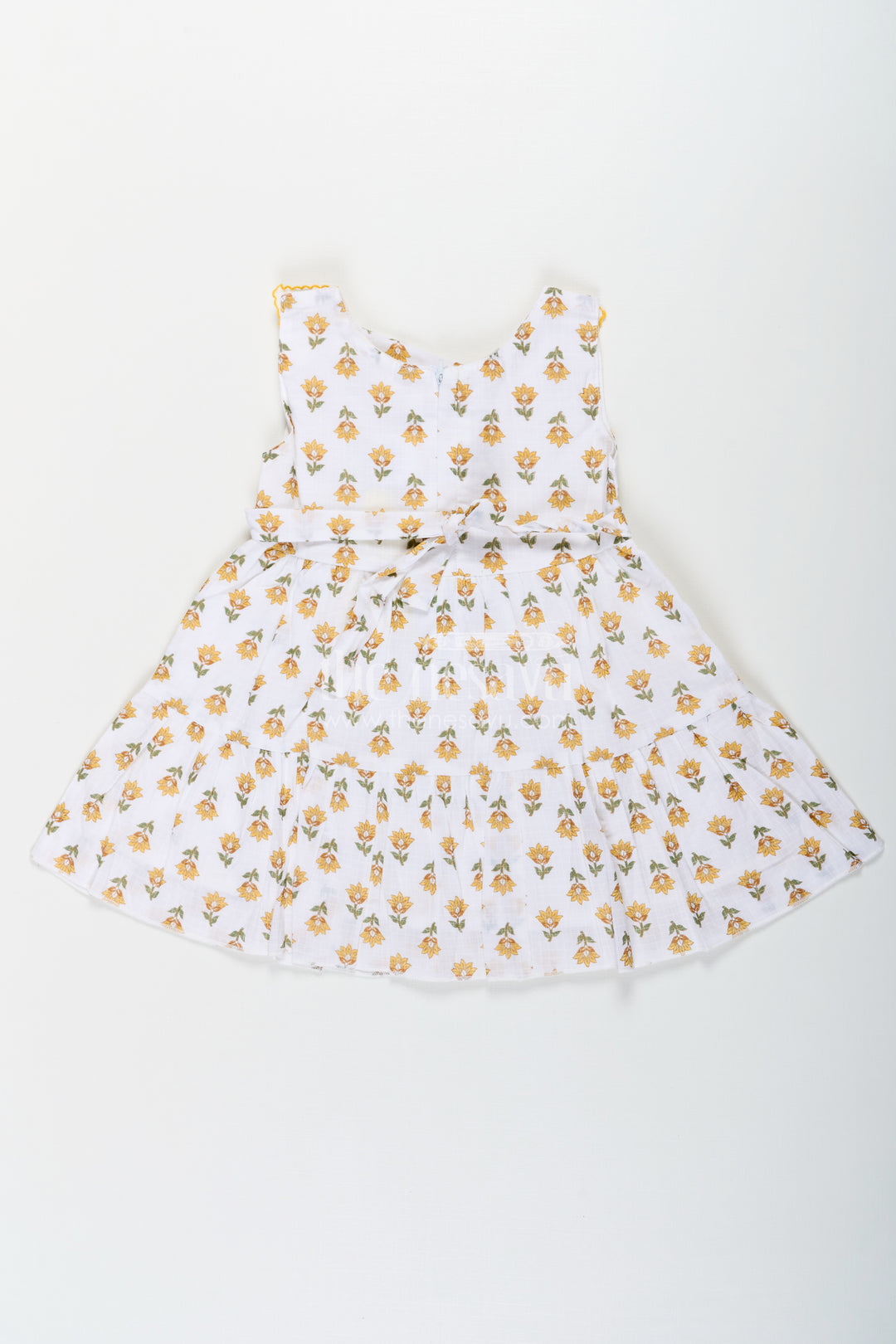 Girls New Modern Frock in Pure Cotton with Floral Prints and Peter Pan Collar