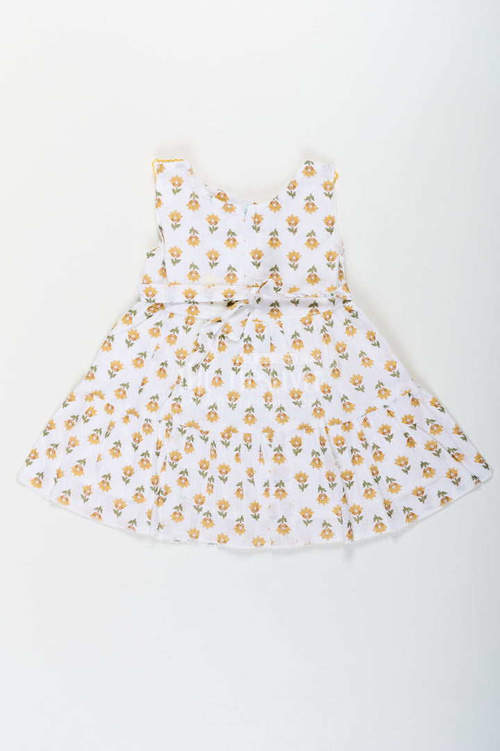 Girls New Modern Frock in Pure Cotton with Floral Prints and Peter Pan Collar