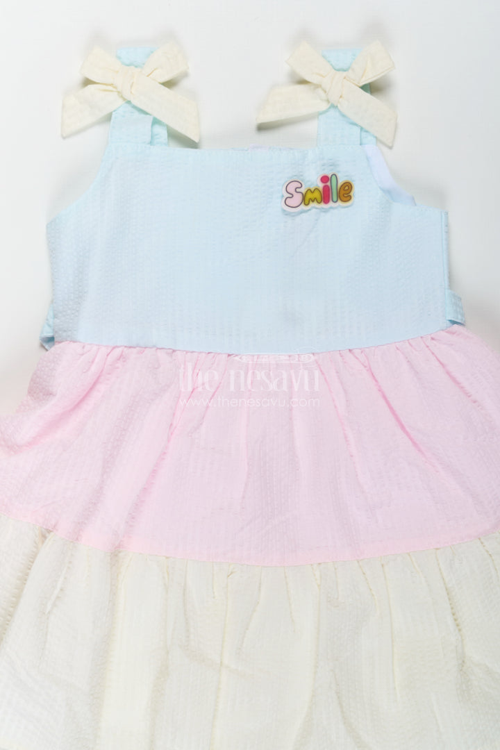 Baby Girls New Party Frock in Cotton with Tiered Pastel Layers and Bow Accents