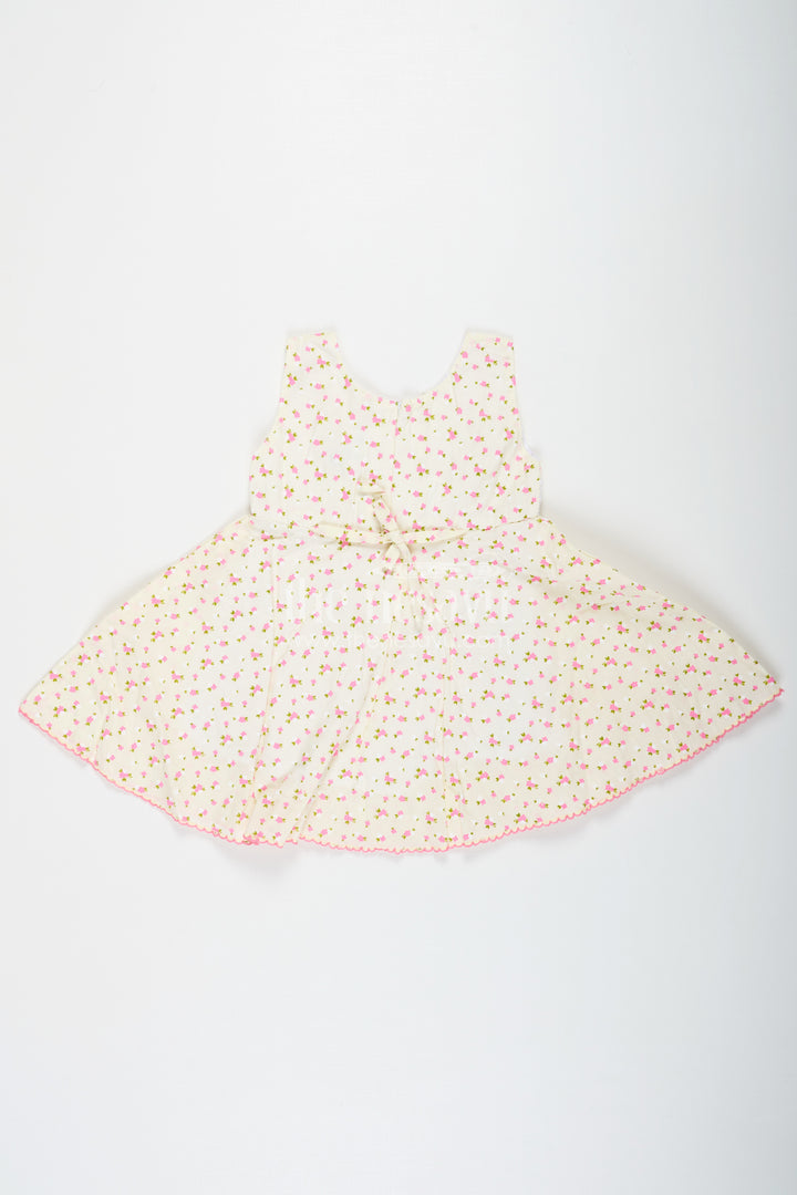 Girls Cream Soft Cotton Dresses Online with Allover Floral Print and Lace Bow Waist Detail