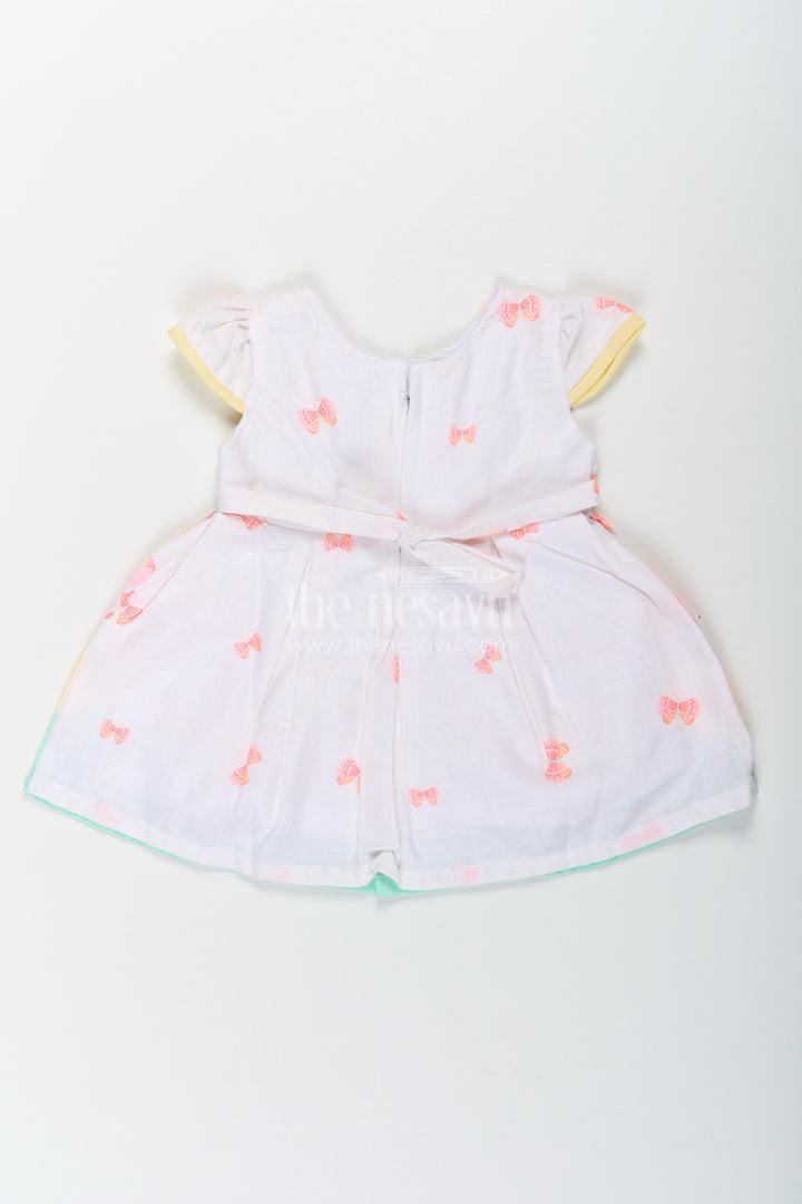 Girls Ugadi Special Frock Dress in Soft Cotton with Pastel Floral Print and Yellow Bow Detail